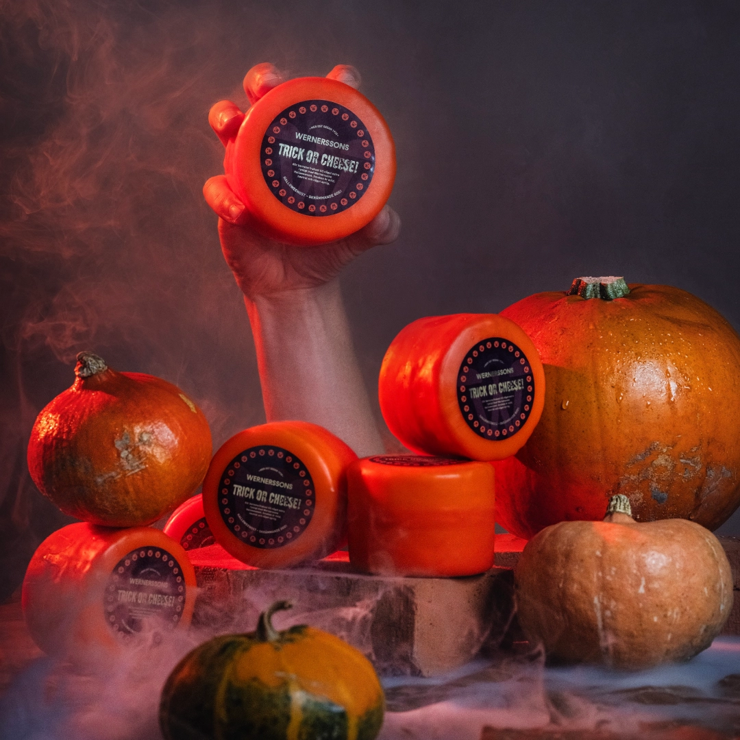 Halloween scene with smoke and a hand holding up a cheese - Ny Studio